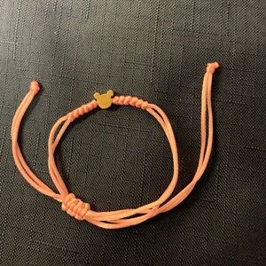 2/$13 pink string bracelet with gold tone Teddy bear head